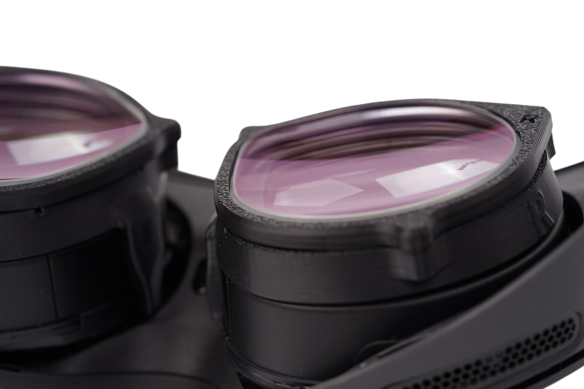Close-up of the magnetic lens frame and coated lens