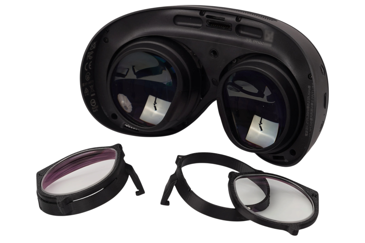 Magnetic prescription lens inserts shown next to the Steam Frame headset
